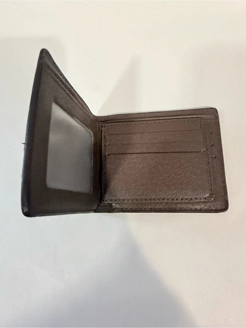 GUCCI Brown GG Supreme Canvas Bifold Wallet Pre-owned.